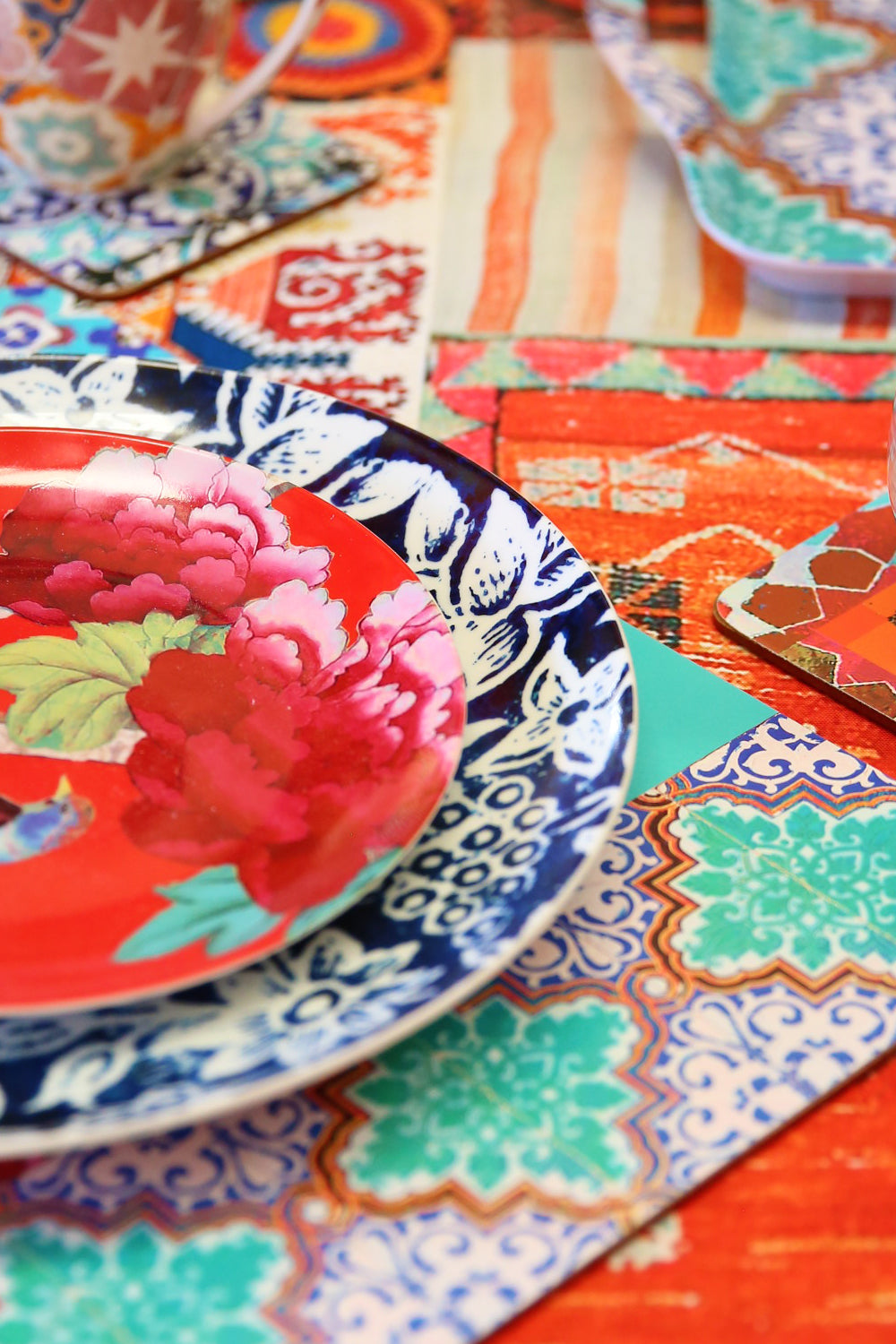 Anna Chandler Vases on Turquoise Placemat set of 4