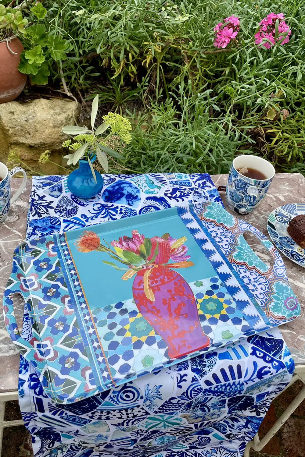 Anna Chandler Melamine Tray Vases on Turquoise