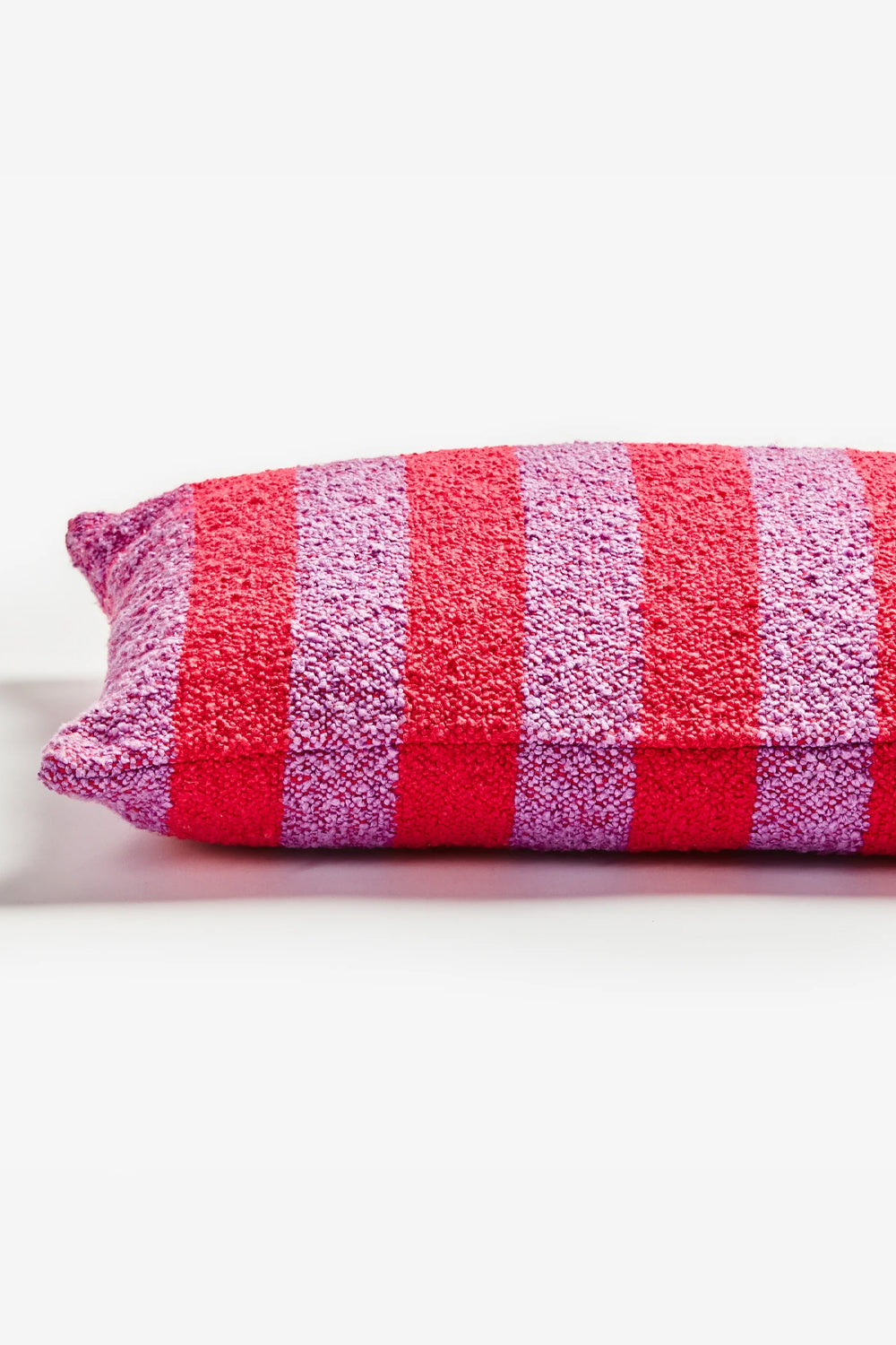 BONNIE AND NEIL BOUCLE STRIPE CANDY CUSHION 60CM X 40CM