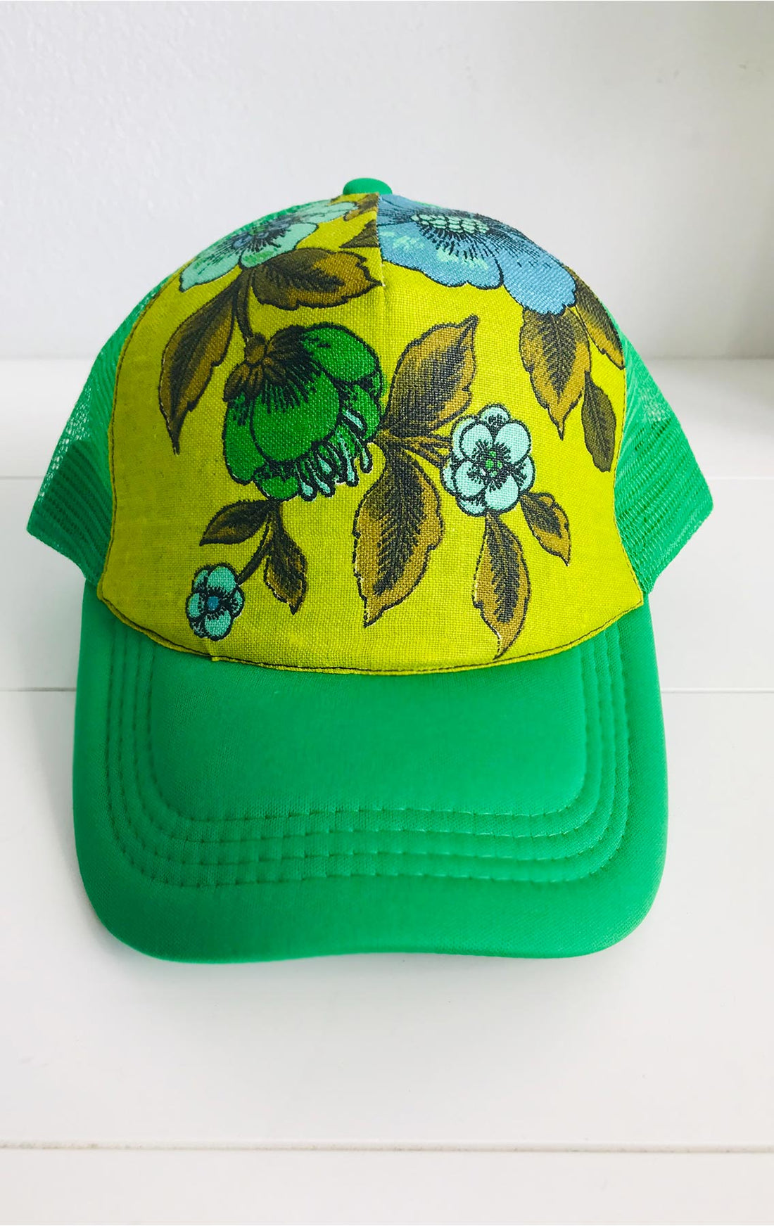 JESSICA WOLF GREEN AND YELLOW FLOWER BLOOM CAP